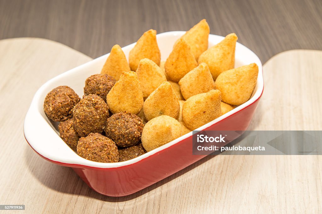 Mix of brazilian fried mini snacks Savory brazilian fried snacks, very comon in birthday parties Salgadinhos - Snack Stock Photo