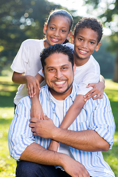 istock happy indian father and kids 527955103
