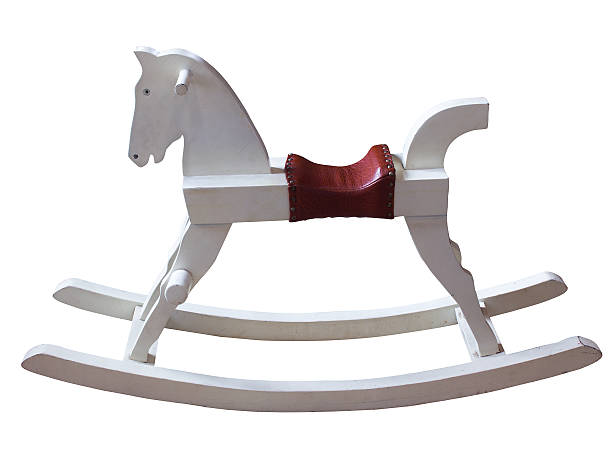 istock vintage rocking horse isolated on white 527956423