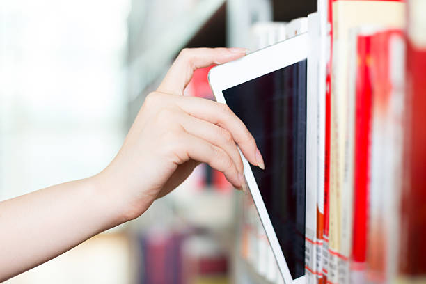 istock young beautiful asian girl university student in library 528042268