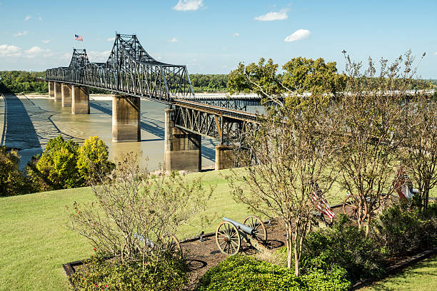 Mississippi Crossing Old and new bridges across the Mississippi River at Vicksburg, TN. vicksburg stock pictures, royalty-free photos & images