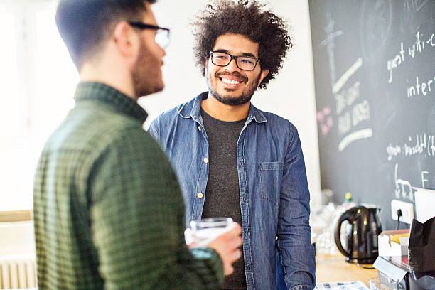 istock Businessman looking at colleague while planning 528045580