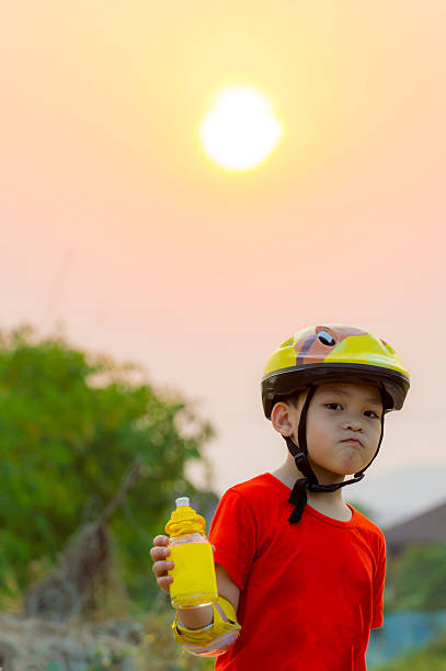 istock Portrait smart Asian kid are riding bicycle 528046512