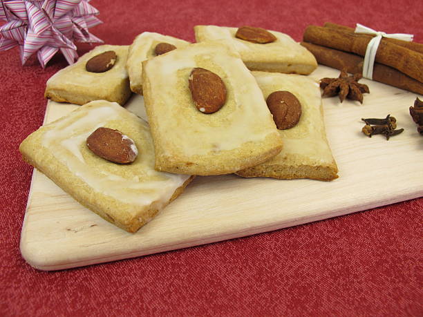 istock Gingerbread cookies with sugar icing and almonds 528049560
