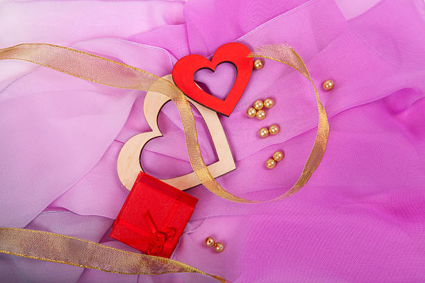 istock gift with pink ribbon,heart 528049784