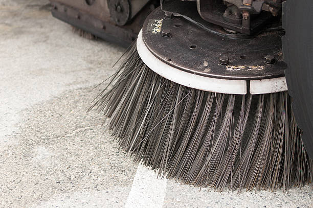 Close-up of a street sweeper vehicle's brush stock photo