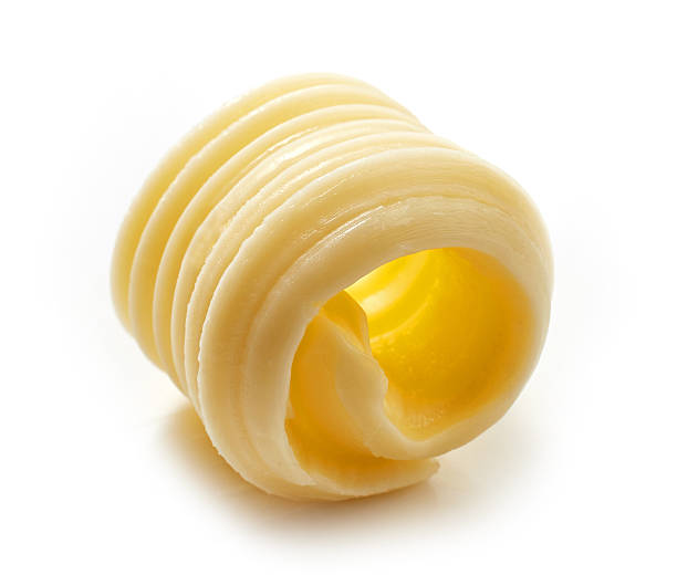 noz de manteiga num fundo branco - baking margarine studio shot macro imagens e fotografias de stock