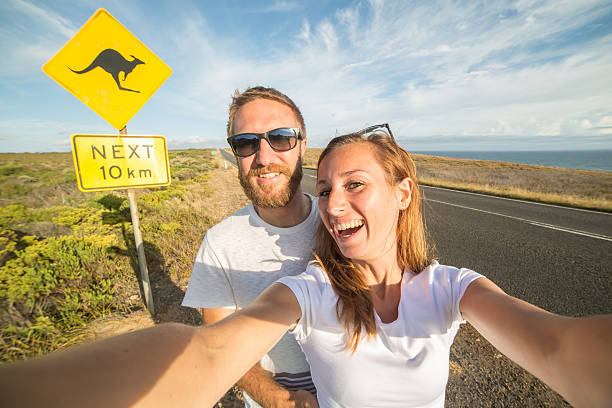 istock Couple take selfie portrait in Australia 528055022