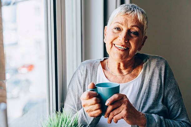 istock happy senior woman 528056532