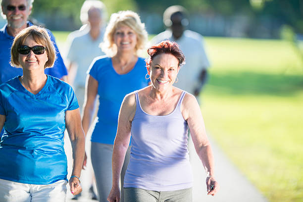 istock Seniors Walking in the Sun 528057456