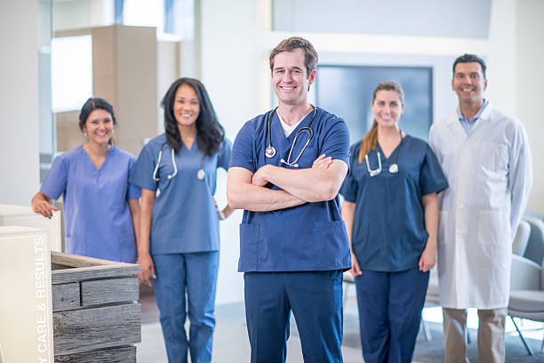 istock Hospital Staff Standing Together 528058026