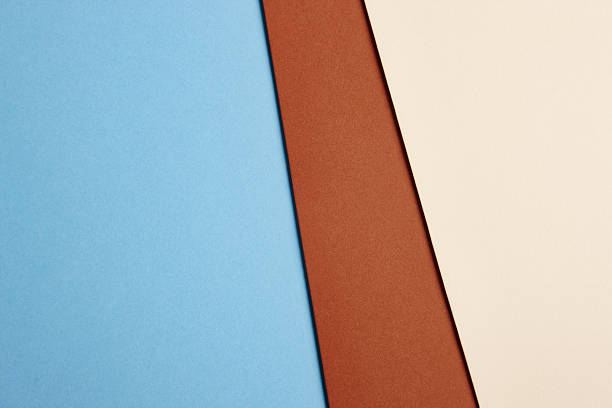 istock Colored cardboards background in blue brown beige tone. Copy spa 528058752