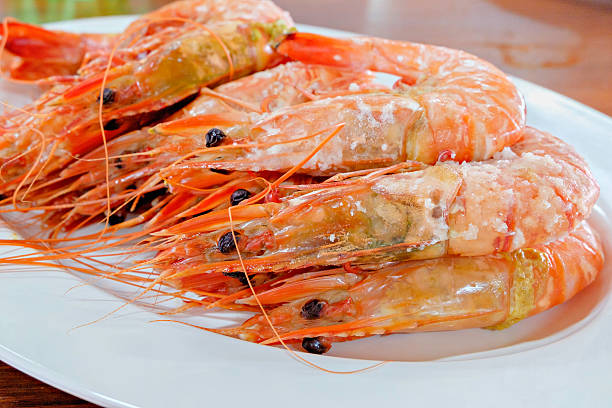 istock thai boiled shrimps prawns with salt flakes on white dish 528058908