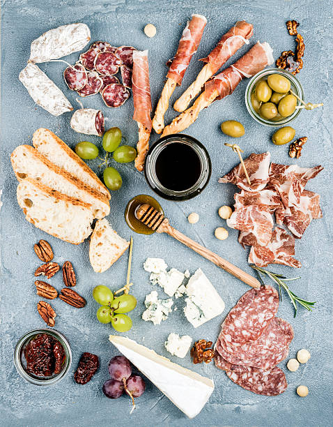 istock Cheese and meat appetizer selection or wine snack set. Variety 528059656