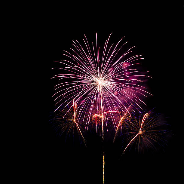 istock colorful fireworks over dark sky background 528060278
