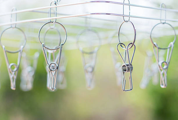 istock stainless steel hanging clothespins 528060788