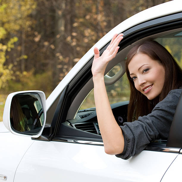 istock Successful woman in the new car 528063012