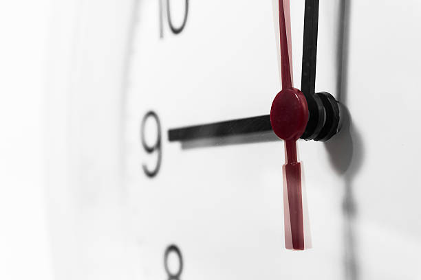 istock Closeup of hands on clock face.sensitive focus 528063550