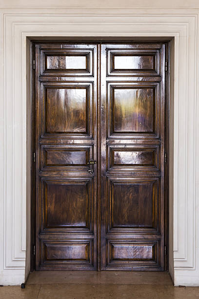 istock Old wooden brown house door 528063900