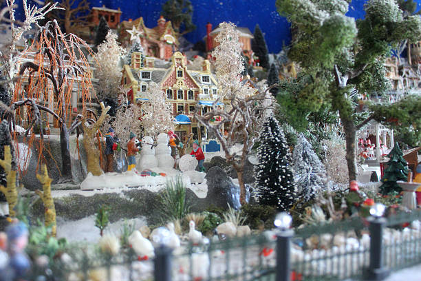 Image Of Model Christmas Village With Miniature Houses People Winterscene  Stock Photo - Download Image Now - iStock