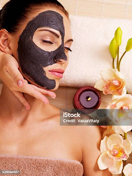 Cosmetologist Doing Massage On The Womans Face In Sap Salon Stock Photo - Download Image Now