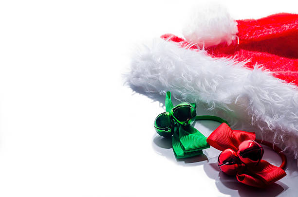 istock santa hat and christmas bells on a white background 528066239