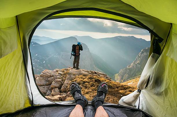 istock View from inside a tent on the man and rock 528066894