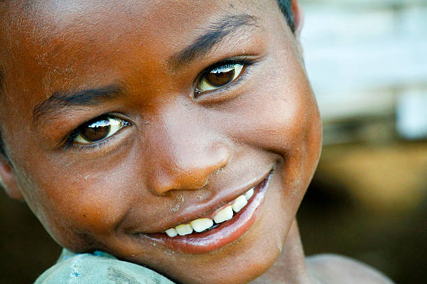 istock Smiling cute african boy with beautiful face - Madagascar 528067151