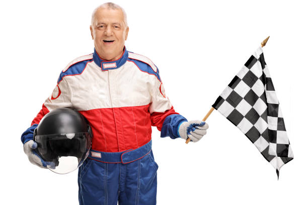 istock Mature man holding a checkered race flag 528068998