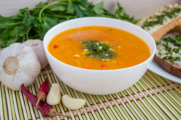 istock Traditional oriental soup with tomatoes, red lentils, green 528070660