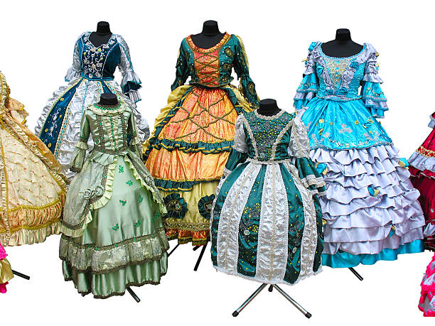 Colorfull stylized woman medieval costume clothes on mannequins isolated