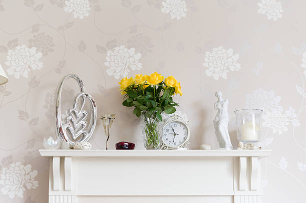 istock Yellow roses, Venus de Milo and ornaments on mantlepiece 528071364
