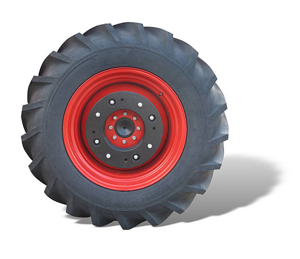 istock Tractor red tire wheel isolated over white 528072296
