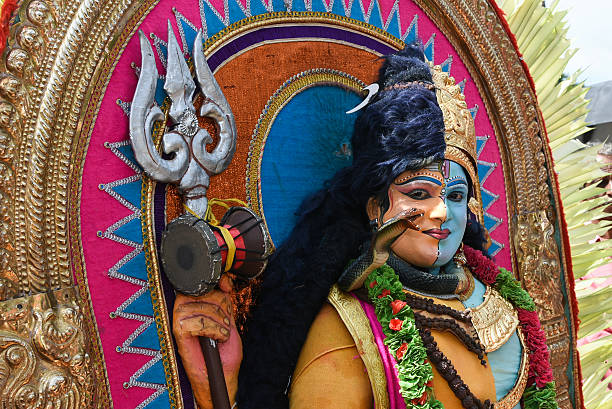 \nKochi,India-August 19,2015:An unidentified man dressed up as mythological characters  Harihara/ Shankaranarayana, participate in a cultural procession as part of Onam celebration held on August 19, 2015 in Kochi, Kerala, India.