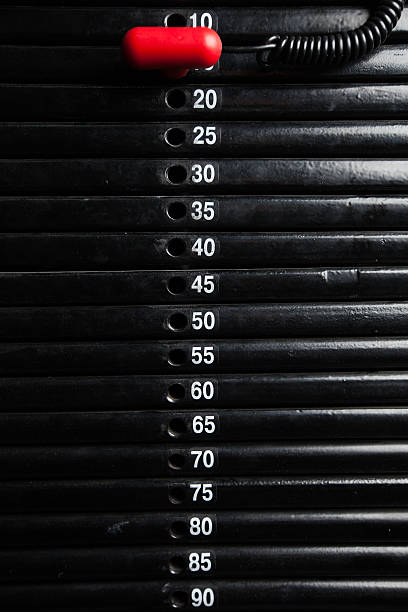 istock machines at the gym room in dark 528073288