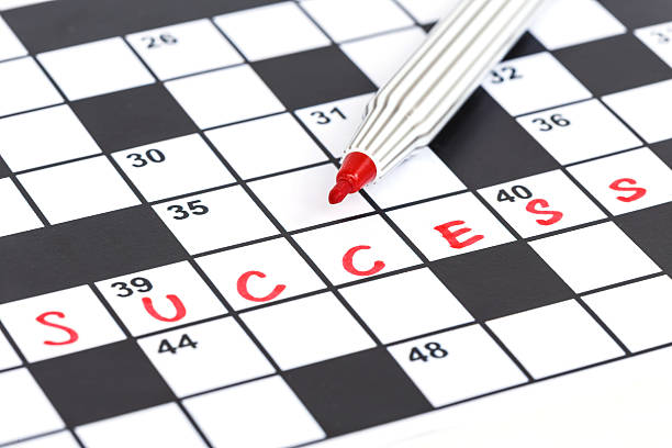 istock Close up red marker on Crossword - Success 528100601