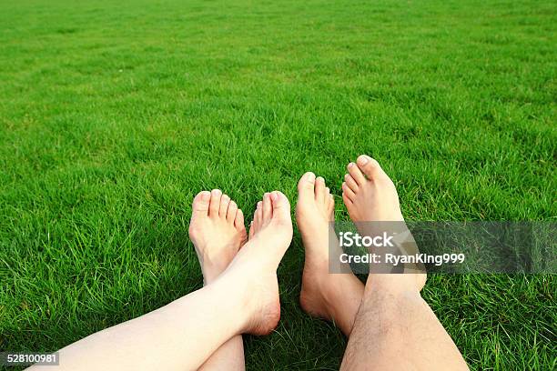 Couple Relax Barefoot Enjoy Nature Stock Photo - Download Image Now - Grass, Barefoot, Couple - Relationship