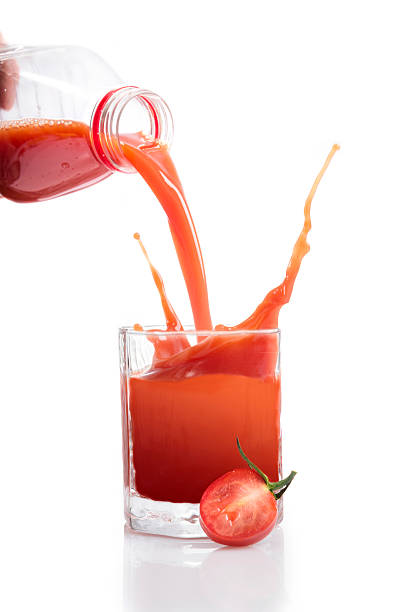 Pouring ruby grapefruit juice