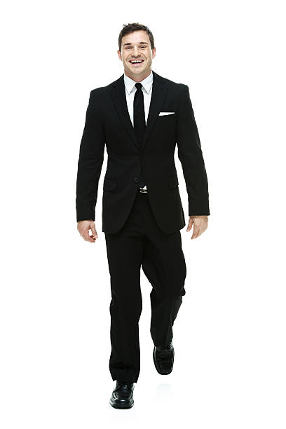 istock Cheerful businessman walking 528101771