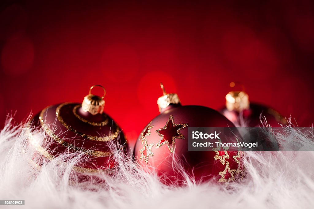 Christmas Baubles Card Photo Blue Bokeh Party Invitation Defocused Decoration Christmas baubles in fur and bokeh background. Impress your clients with this sophisticated and elegant design. Shot captured with a Zeiss Makro-Planar T* 2/50mm. Christmas Stock Photo