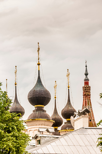 Russian Orthodox churches with their onion domes against a cloudy sky