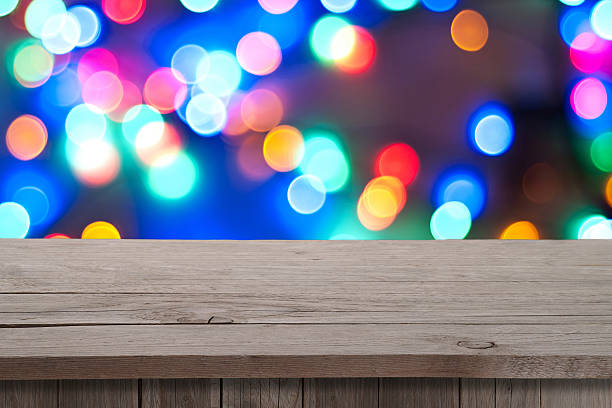 istock Christmas holiday or party background with empty wooden deck tab 528103695