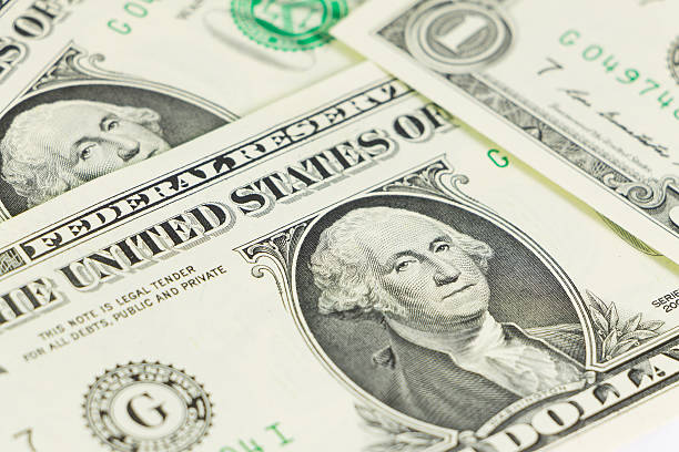 istock Close-up of one dollar on background 528105995