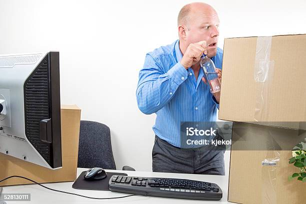 Businessman Drinks Alcohol At The Office Stock Photo - Download Image Now - Achievement, Adult, Adults Only