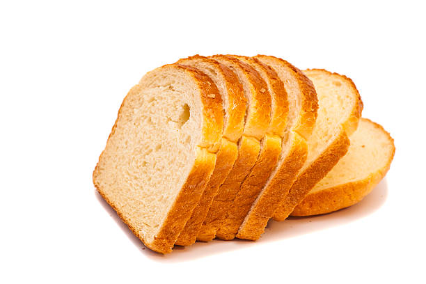 istock The cut loaf of bread isolated on white 528130433