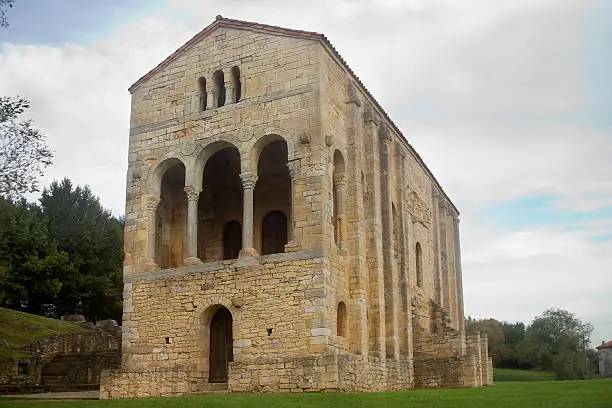 Prerromanesque church of Santa María del Naranco on a green meadow, in Oviedo, Asturias, Spain.