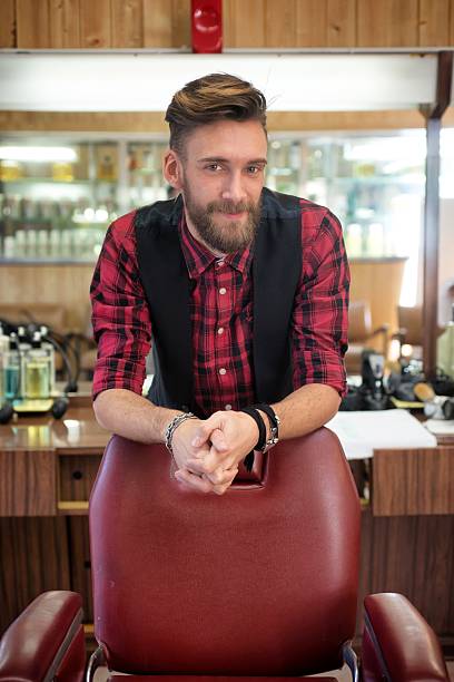 istock Young Bearded Hipsters at the Barber Shop. 528130863