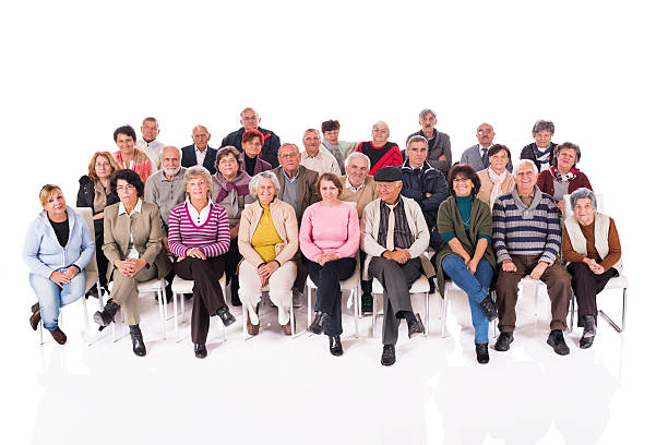 istock Group of seniors isolated on white. 528131911