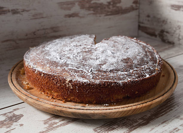 istock Portion of sponge cake on a wooden plate 528132387