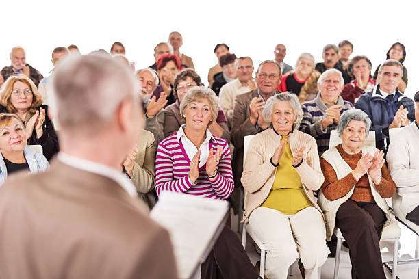 istock Large group of seniors at education event. 528133531